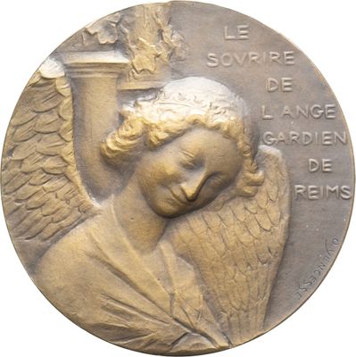 une image représentant une médaille de bronze sur laquelle figure un ange