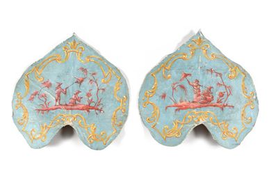 pair of blue and gold painted shell shaped vases with boats on them