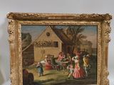 tableau représentant une réunion de famille dans un jardin, avec une maison en arrière-plan