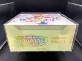 a close up of a box on a black surface with a logo on it