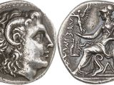 a silver coin with an image of a man and a woman on it