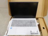 a laptop that is in a box on the floor