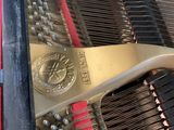 a close up view of a piano with the keys missing