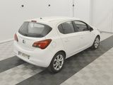 a picture of a white car parked in a garage