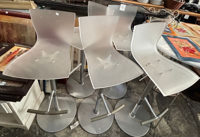 a lot of chairs that are sitting on the floor