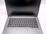 the laptop is open and ready to be used on the desk