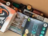a box full of shotgun cartridges and a box of cartridges