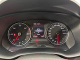 a close up of a car dashboard with a speedometer and gauges