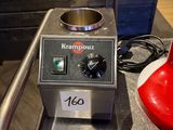 a machine that is sitting on a counter in a kitchen