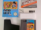a box of dragon ball and a game on the table