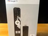 a box that has a remote and a remote control in it