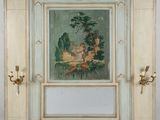 tableau accroché au mur d'une pièce où se trouvent un miroir et deux appliques
