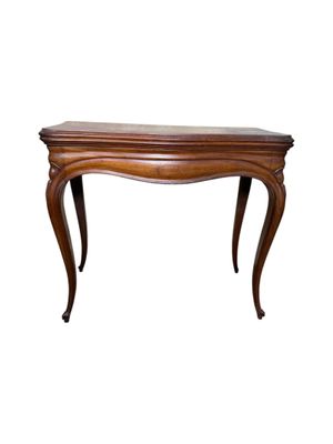 a wooden table with a curved top and legs
