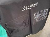 a black shirt that is sitting on top of a cart