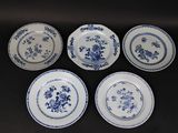 six blue and white plates with floral designs on them on a table