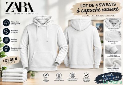 un sweat-shirt blanc à capuche et une serviette posés sur une table