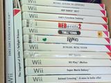 a lot of wii games in a box together