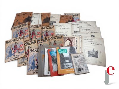 a lot of books that are sitting on a table