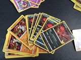 a lot of cards that are on the table