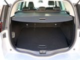 a trunk of a car with the back seats folded open