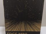 an open box of edge mini glass mirror art case on a white surface