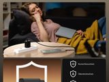 a picture of a woman sitting on a couch with a laptop on her lap