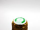 a bottle of beer sitting on top of a table