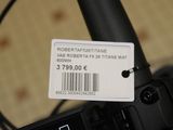 a label on the handlebar of a bicycle with a barcode attached to it