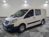 a picture of a white van parked in a room