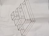 a drawing of a book shelf on a piece of paper