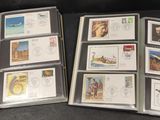 a lot of stamps in a folder on the table