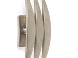 silver plated ring with curved design on a white background