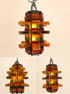 four different views of a multicolored glass chandelier hanging from a ceiling