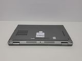 a laptop that is sitting on a white table