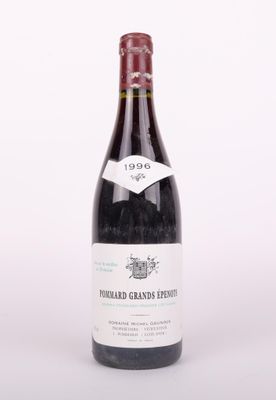 a bottle of wine that is sitting on a table