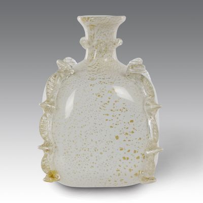 an image of a white vase with gold speckles on it