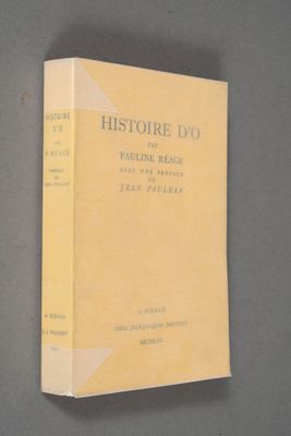 a book with a yellow cover sitting on a table