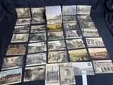 many old postcards of different types and sizes on a table