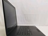 an open laptop computer sitting on top of a white table