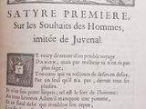 an open book with a picture of a man riding a horse