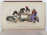 an old book with a drawing of a group of people sitting around a table