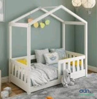a picture of a child ' s room with a bed and a crib