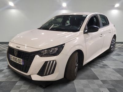 the white car is parked on a checkered floor in the garage