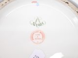a plate with a label on it sitting on a table