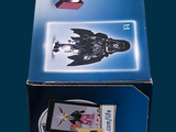 an image of a blue box with a bunch of stickers on it
