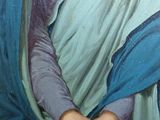 painting of a woman in a blue robe holding a blue shawl
