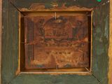 painting of a wooden frame with a map in the middle