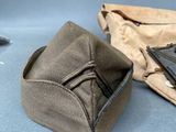 a brown bag with a cell phone inside of it