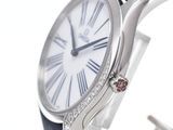 a close up of a wrist watch with roman numerals on it