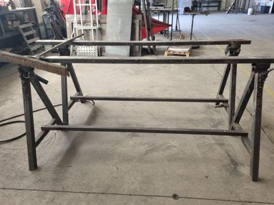 an image of a table made of steel and wood
